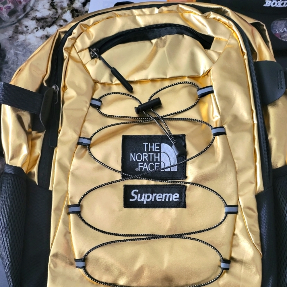 AUTHENTIC NORTH FACE SUPREME GOLD METTALIC BOREALIS BACK PACK